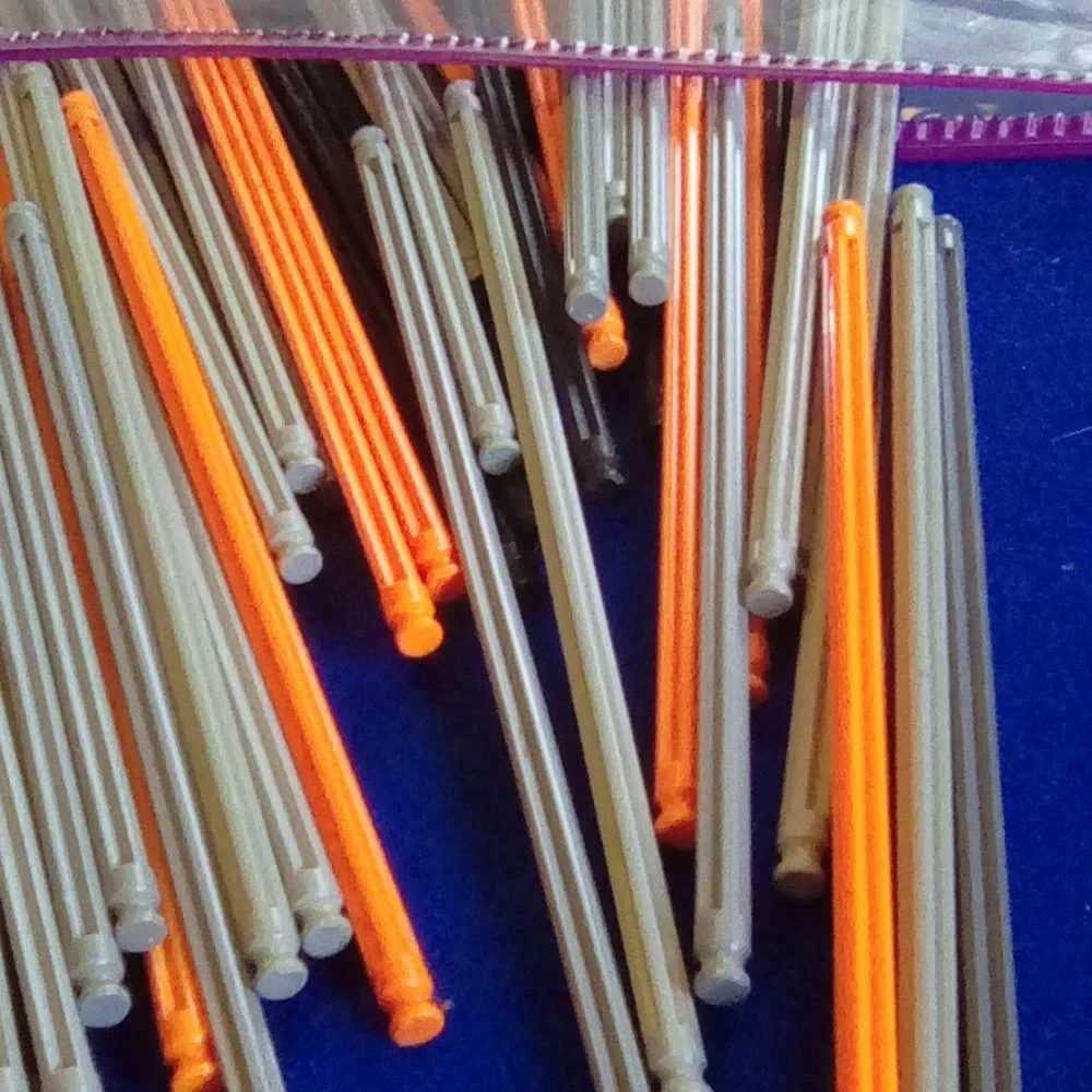 K'NEX 190 mm rods, grey, black, orange.